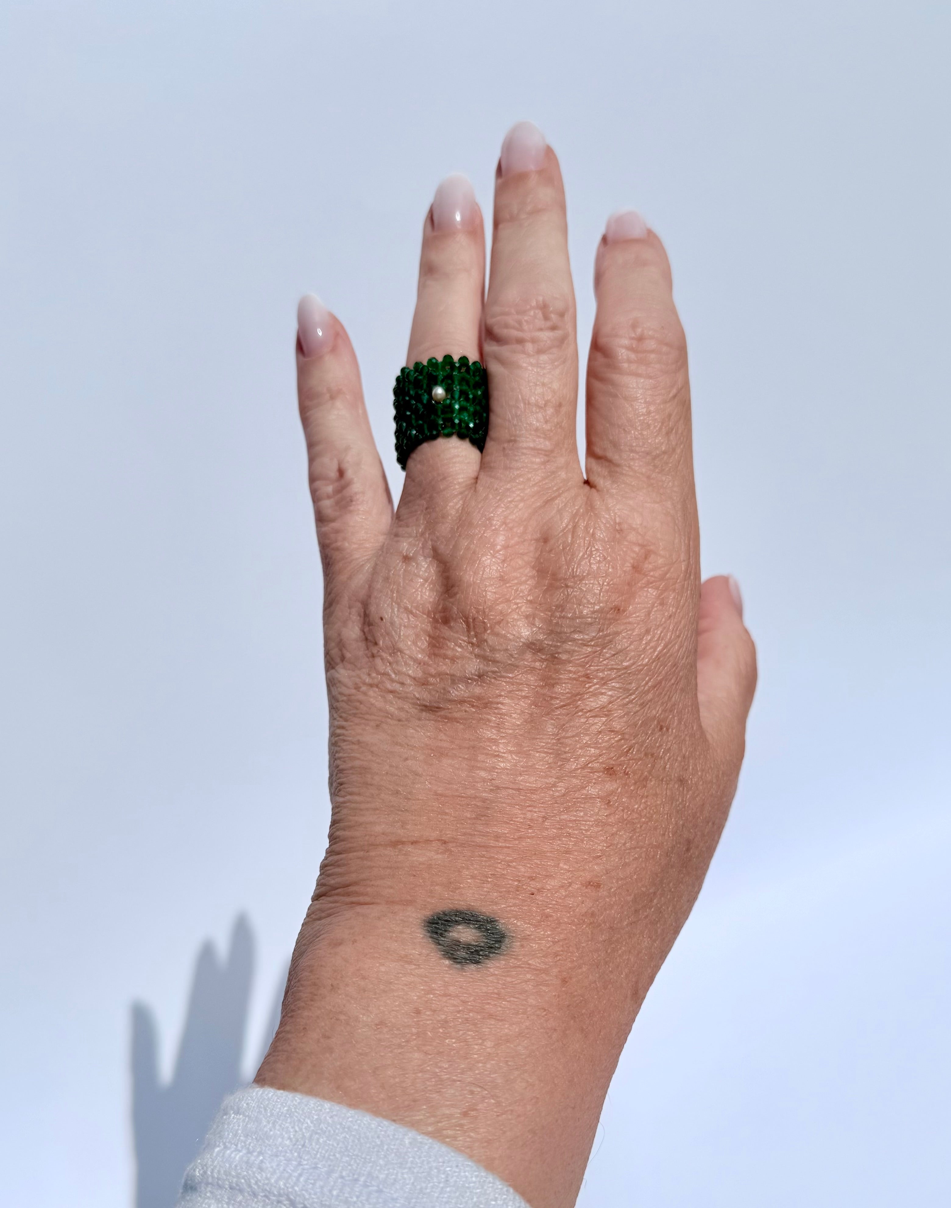 Emerald ring with Pearl accent