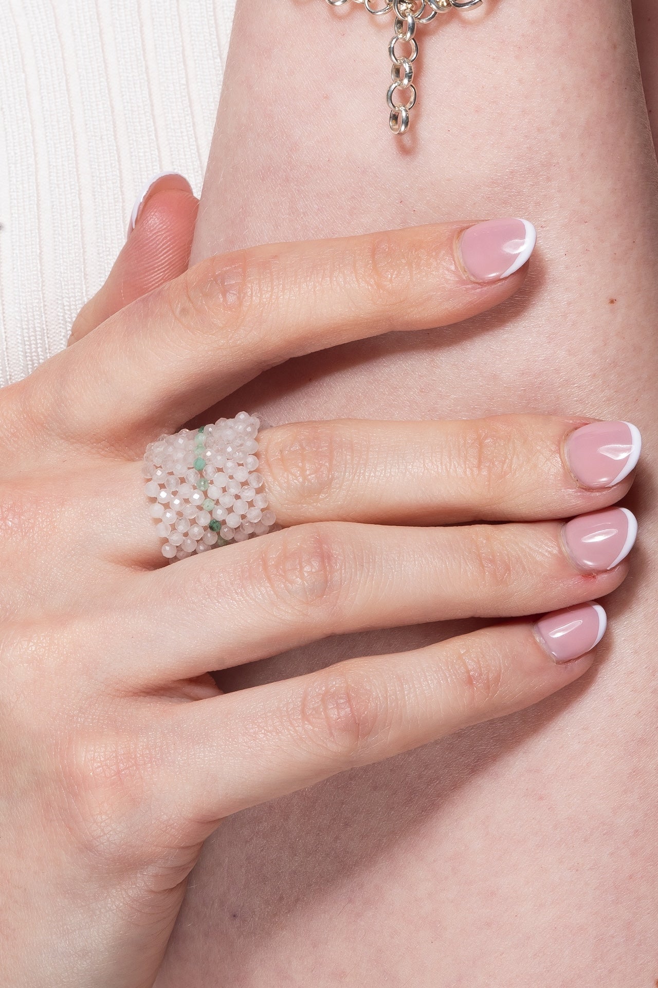 Rose quartz and emerald ring