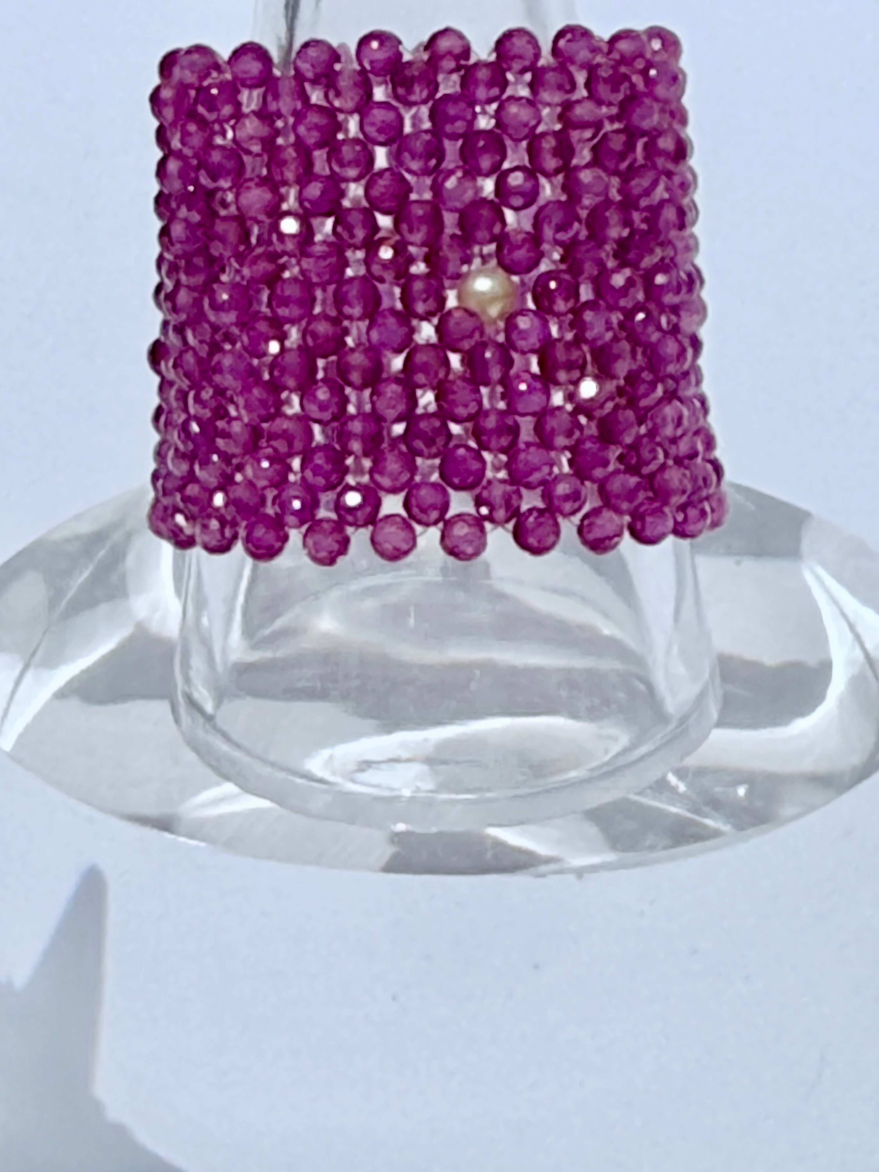 Ruby ring with natural pearl accent
