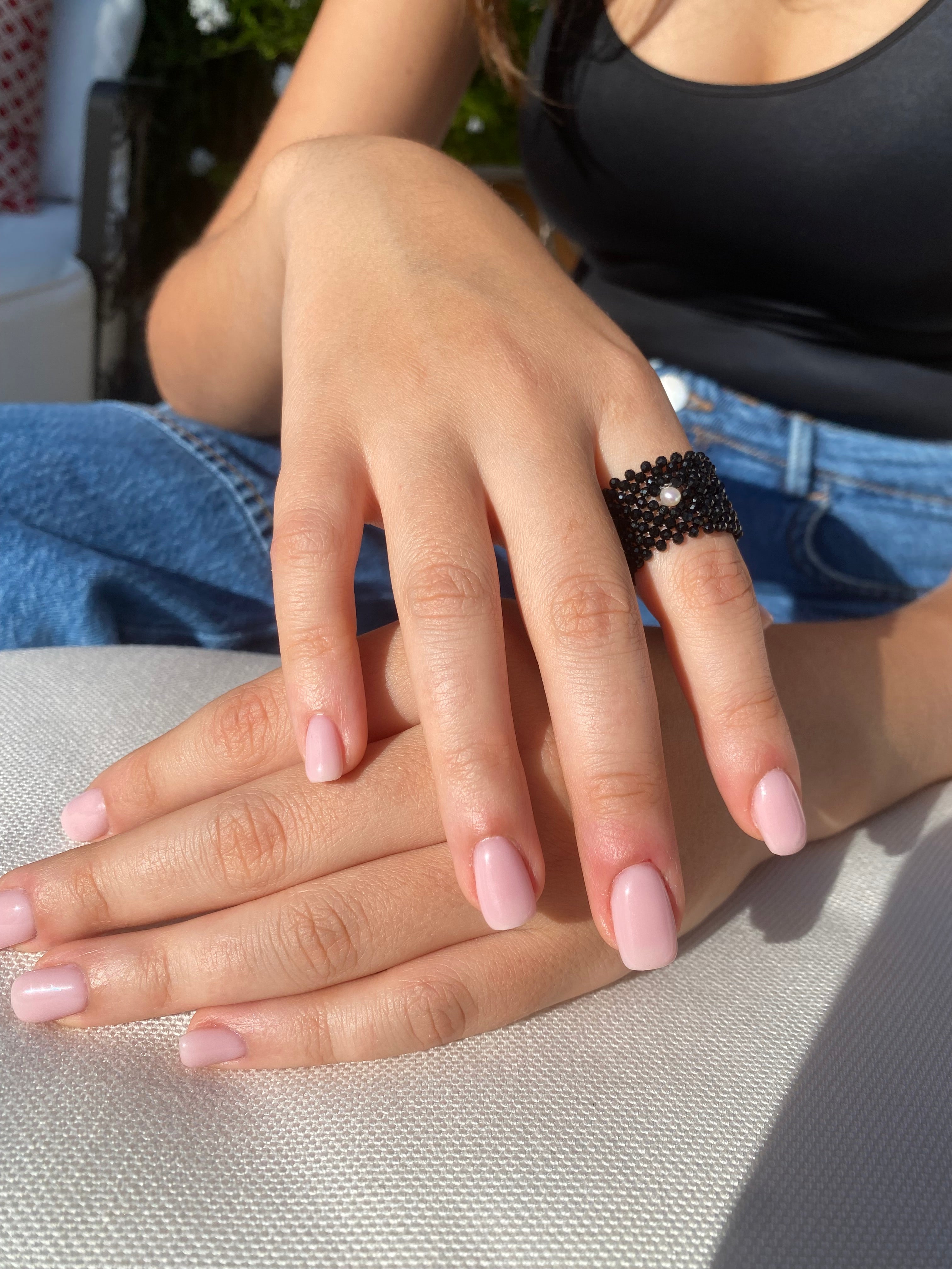 Onyx ring with natural pearl detail
