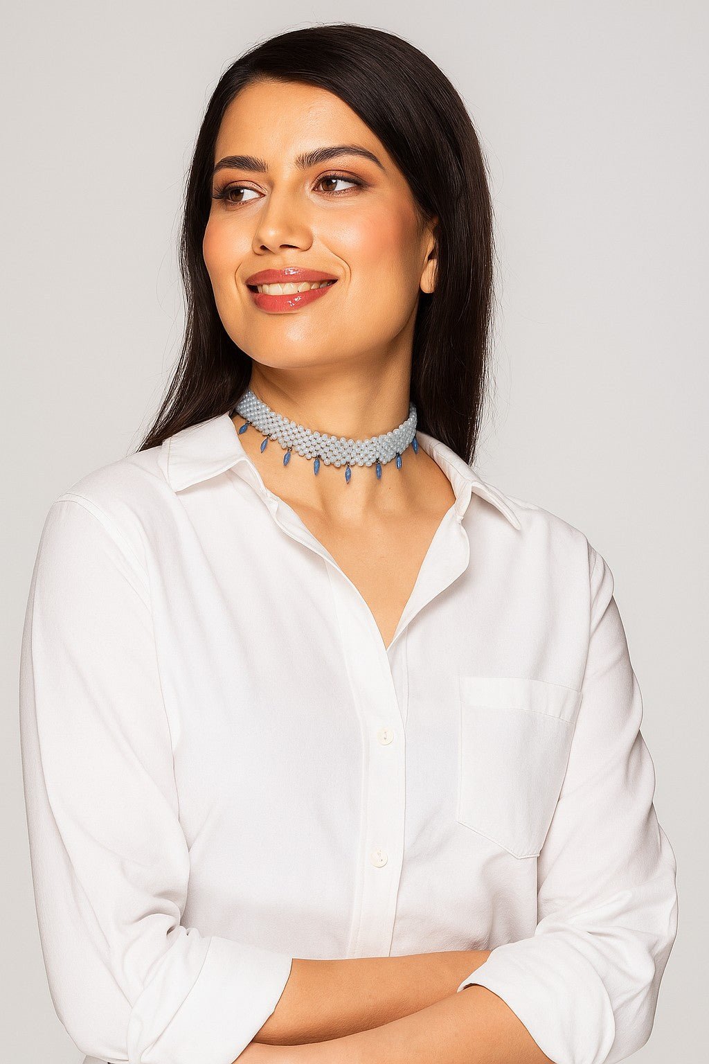 Model wearing quamarine choker with kyanite drops - Carla Ciminera